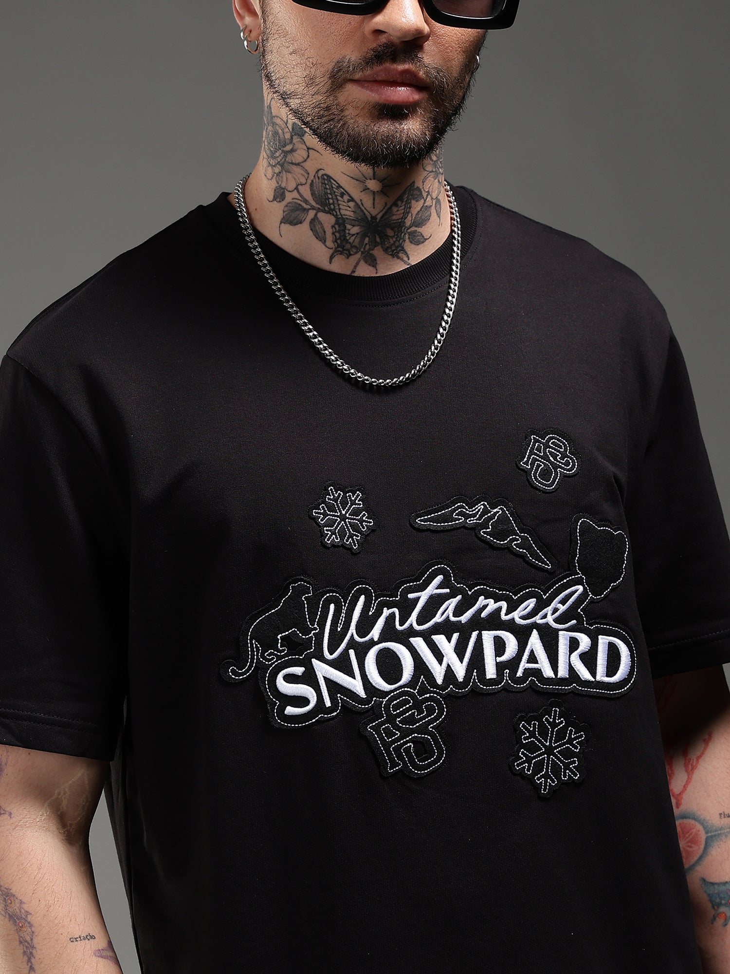 SNOWPARD Black Icon Signature T-Shirt - Detail | Embroidered Chest Patch Close-Up
