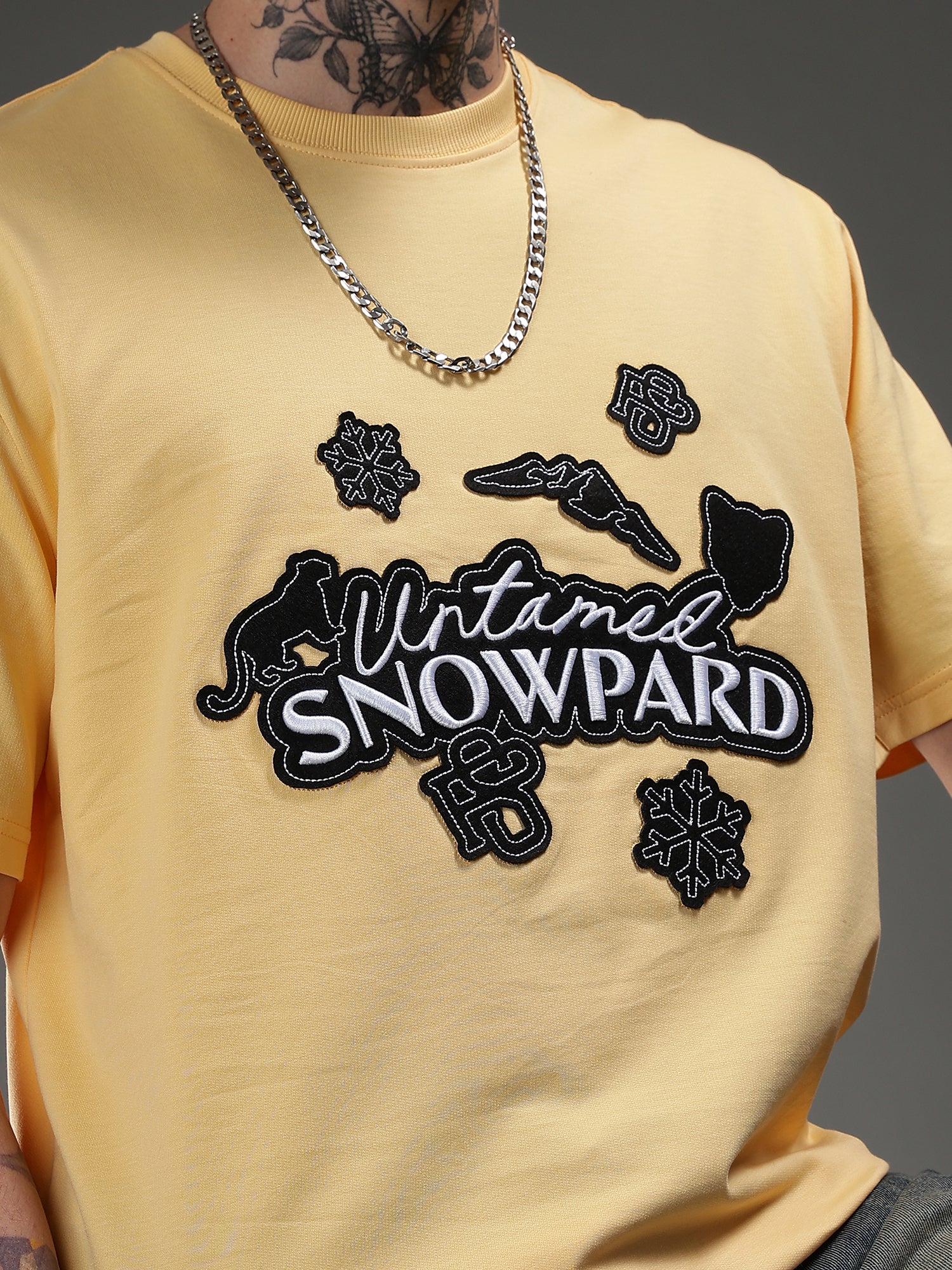 SNOWPARD Yellow Icon Patch T-Shirt Sun Yellow - Detail | Layered Embroidery Chest Close-Up