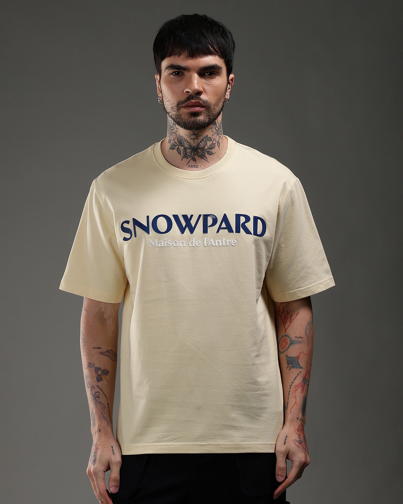 Snowpard Maison de l'Antre Relaxed Tee Beige — front view, men's graphic t-shirt India