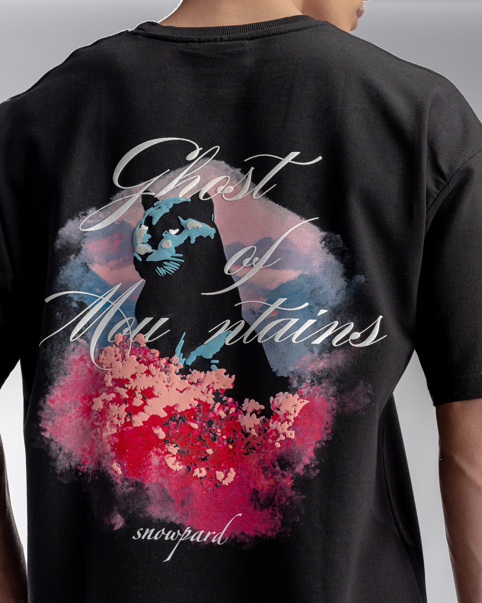 Snowpard Ghost of Mountains Puff Print Tee Black — back view, leopard emblem puff print