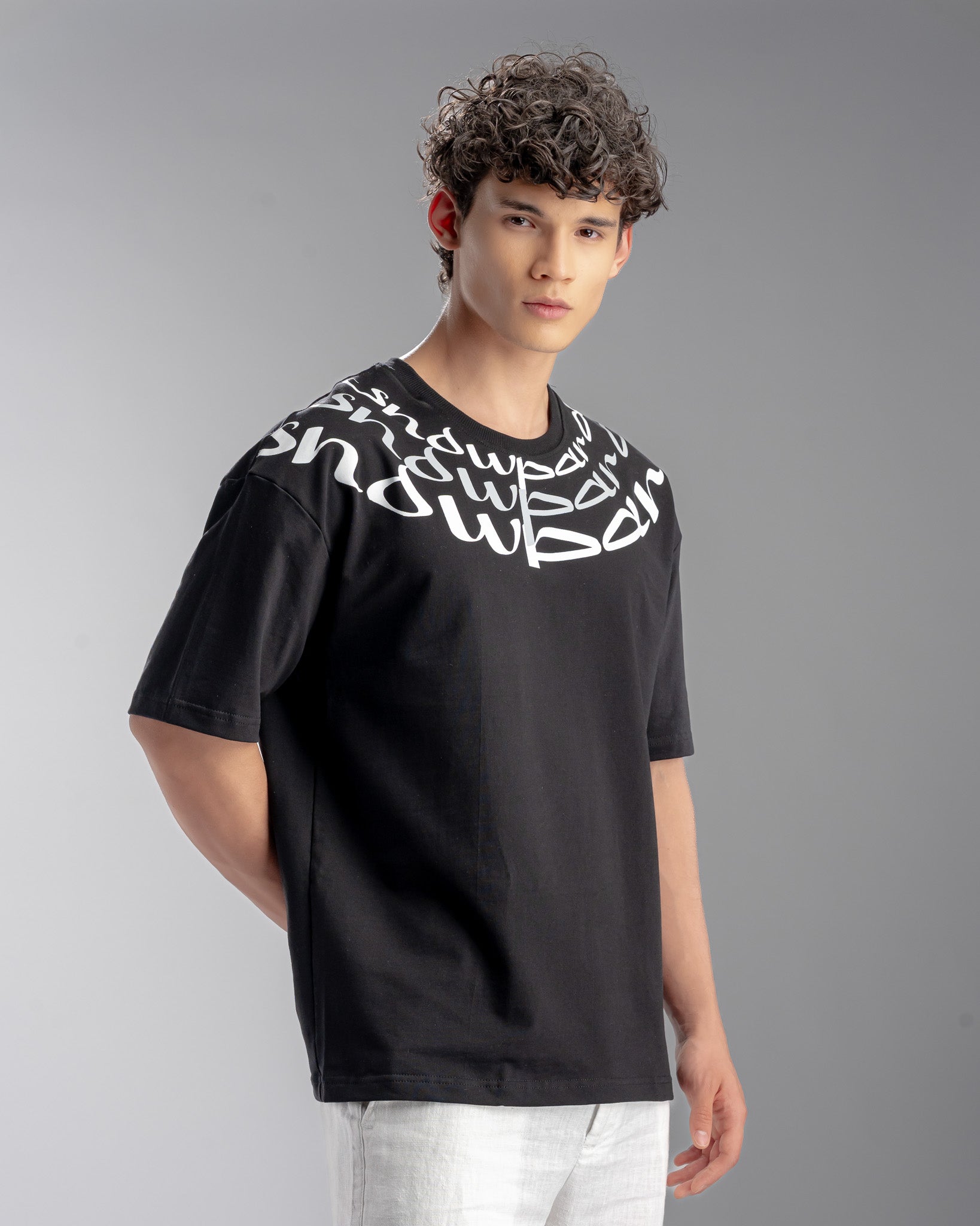 Snowpard Neck Script Oversized Tee Black — back view, bold neck script wrap design
