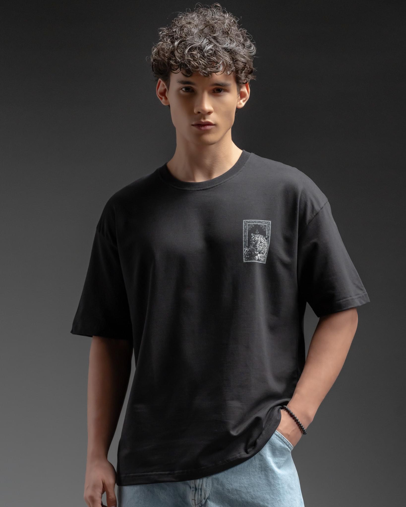 Snowpard Black Carpet Oversized Tee — back view, Persian carpet leopard artwork