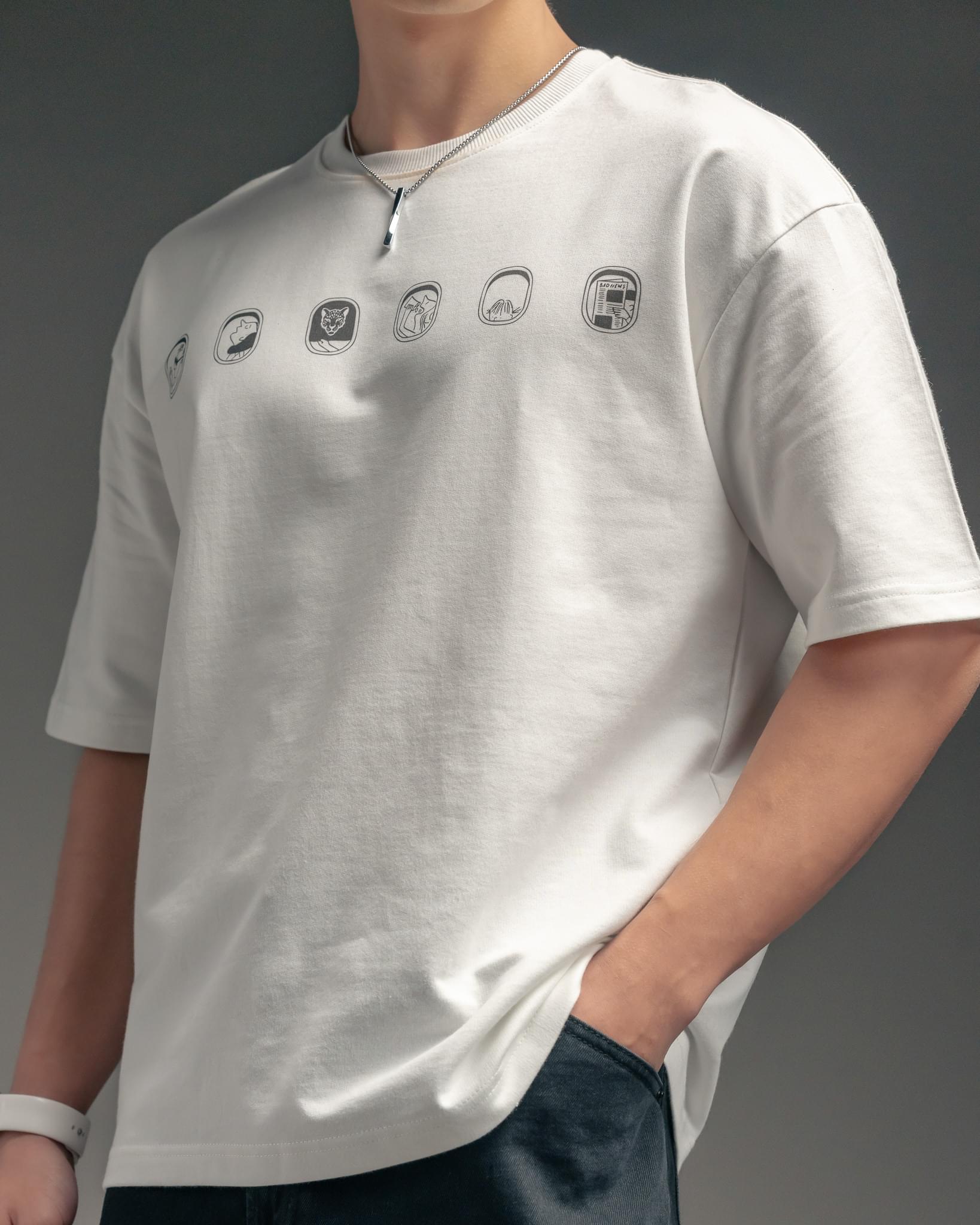 Snowpard Stamped Flight Relaxed Tee White — chest detail, front emblem close-up