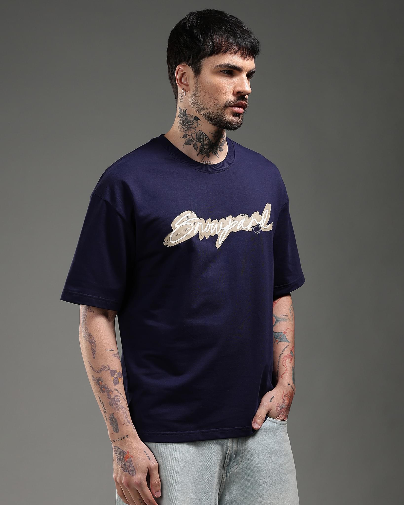 Snowpard The Art Relaxed Tee Navy — back view, script brushstroke base graphic