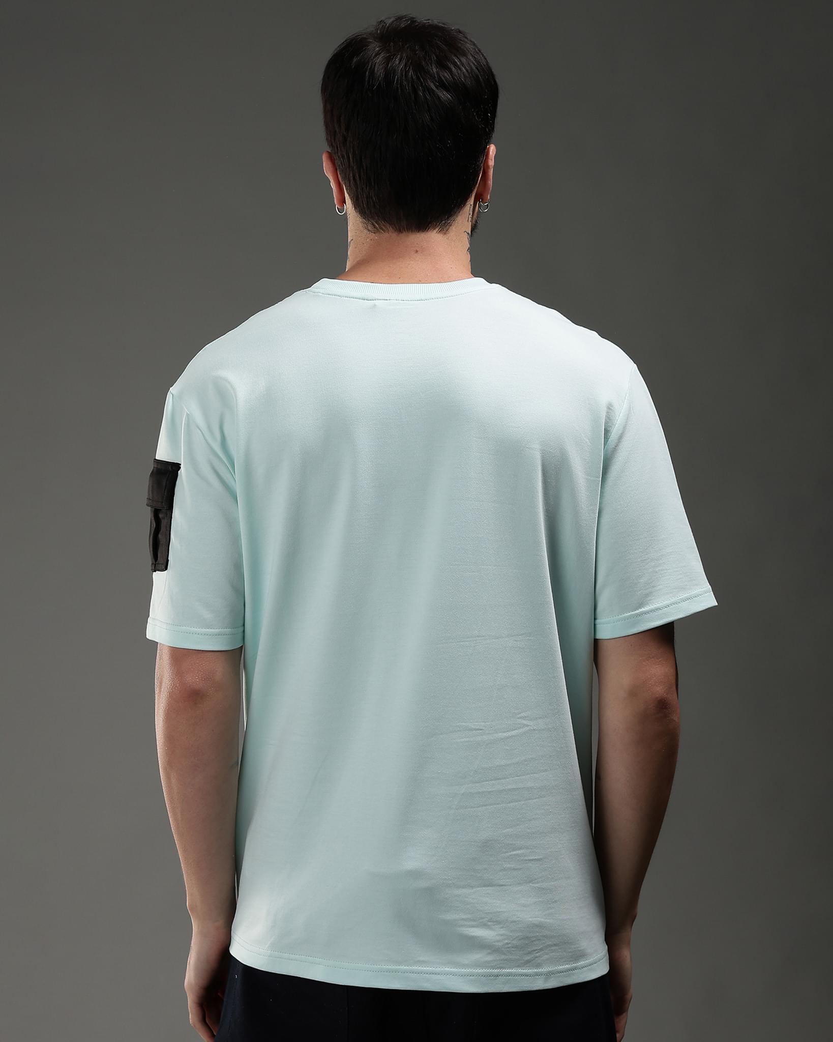 Snowpard Utility Logo Relaxed Tee Ice Mint — sleeve detail, utility pocket close-up
