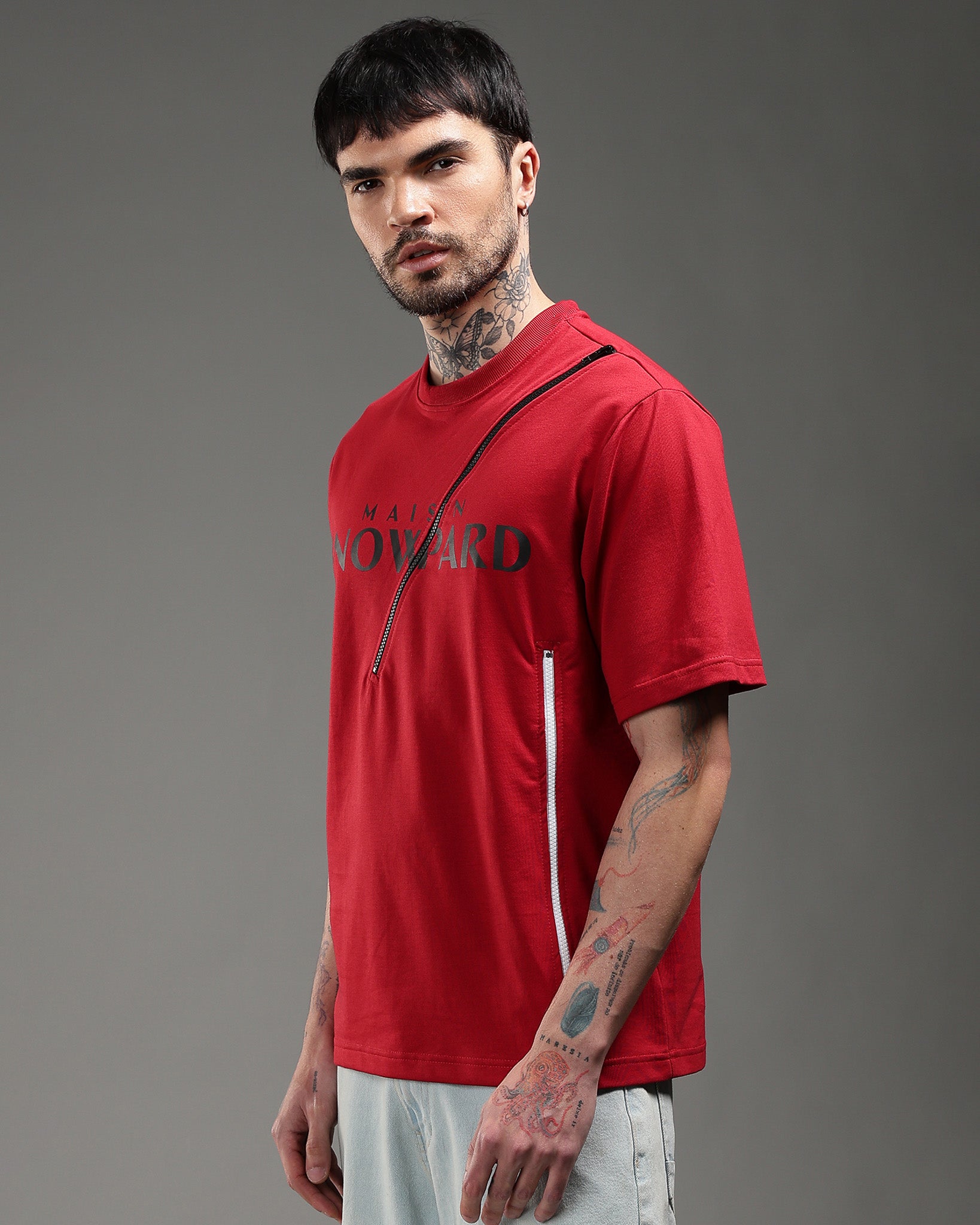 Snowpard Crimson Zip Relaxed Tee Red — back view, diagonal metal zip chest graphic