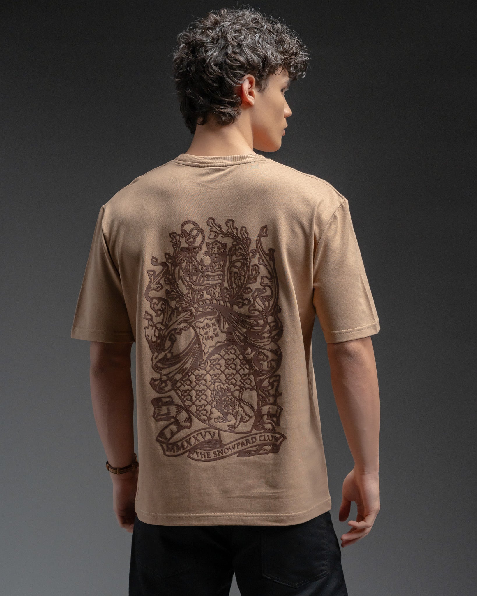 Snowpard Club Crest Relaxed Tee Desert Tan — front view, men's embroidered t-shirt India