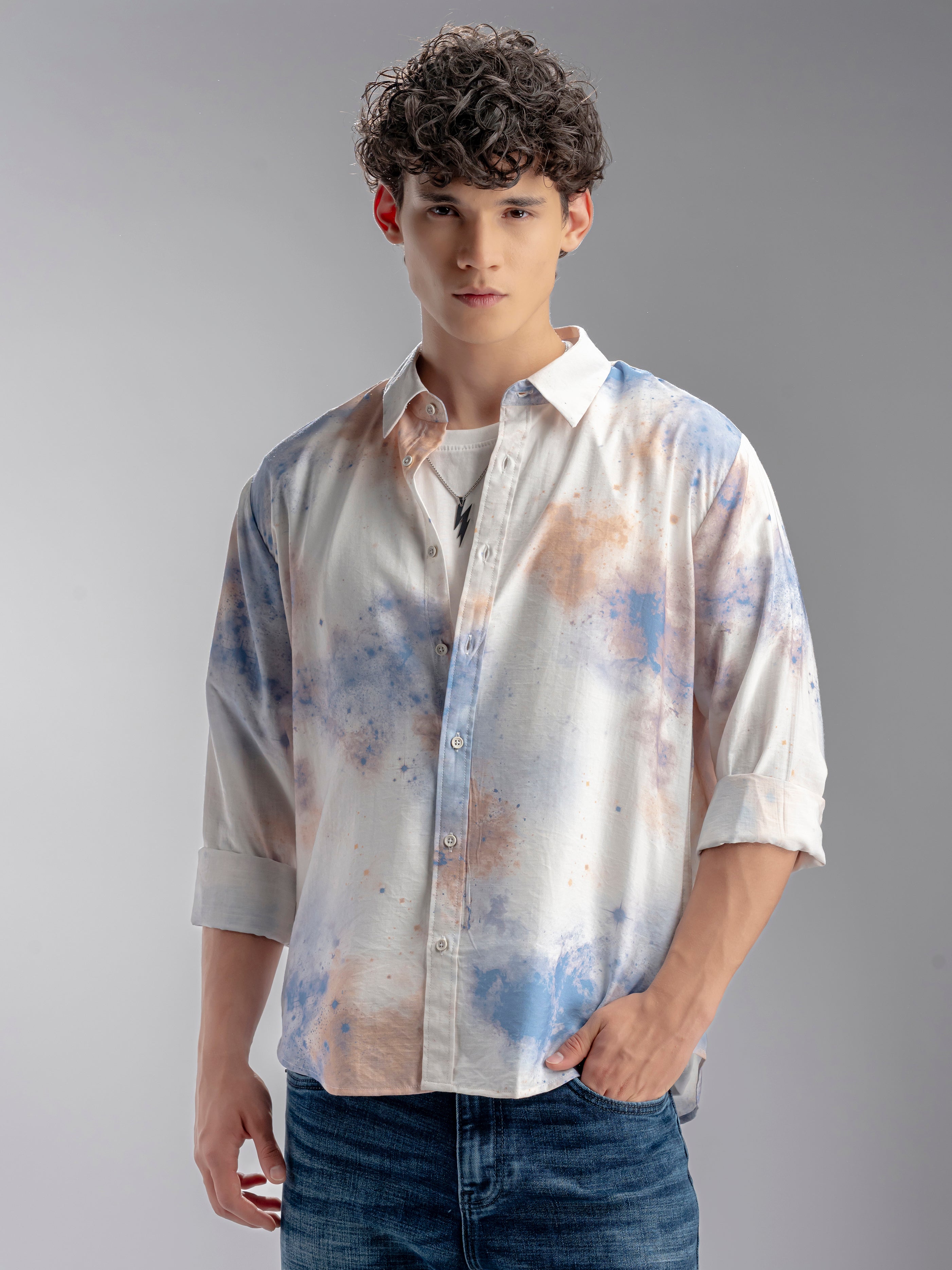 Man wearing a tie-dye shirt with 