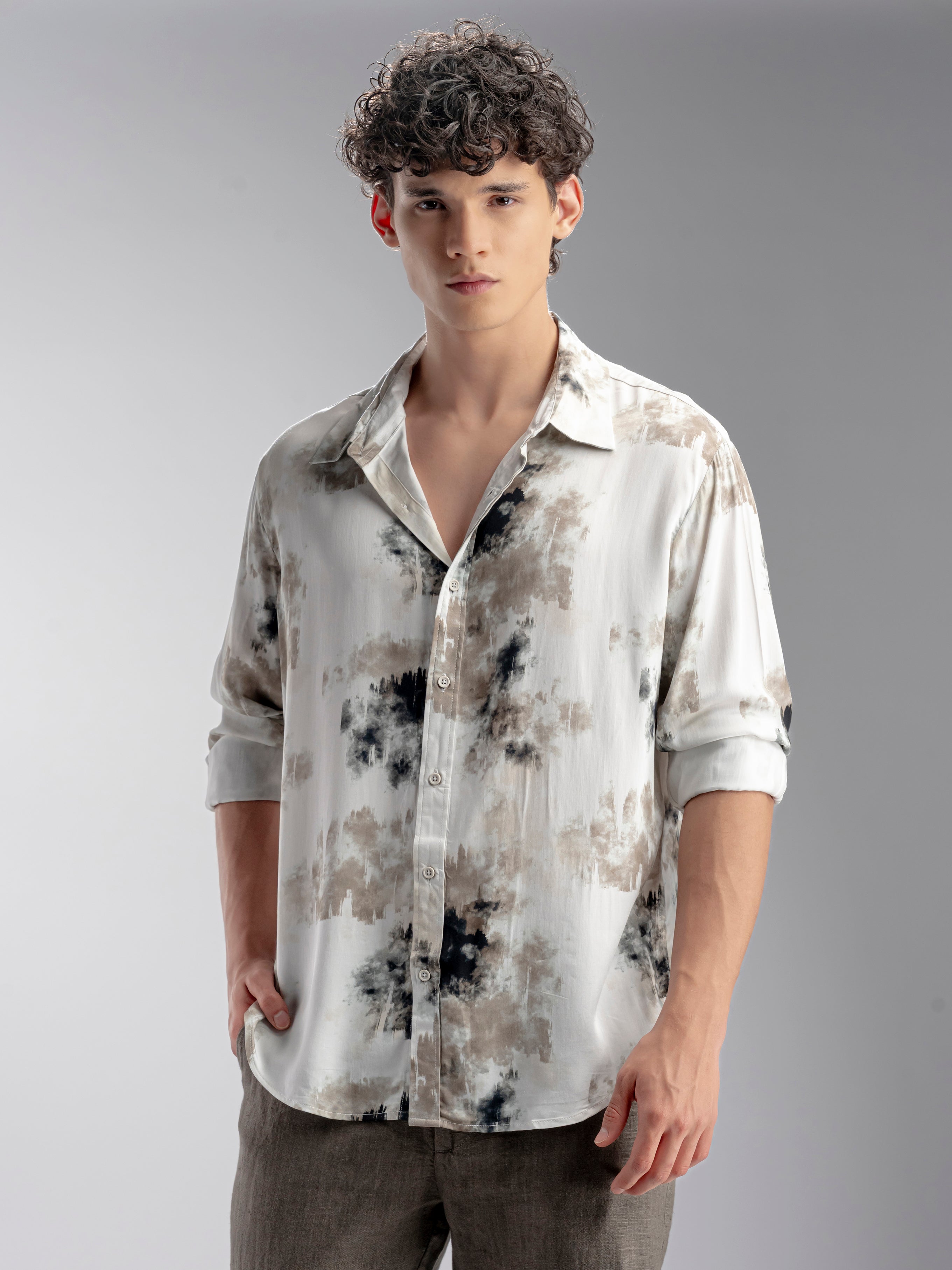 Man wearing a patterned shirt 