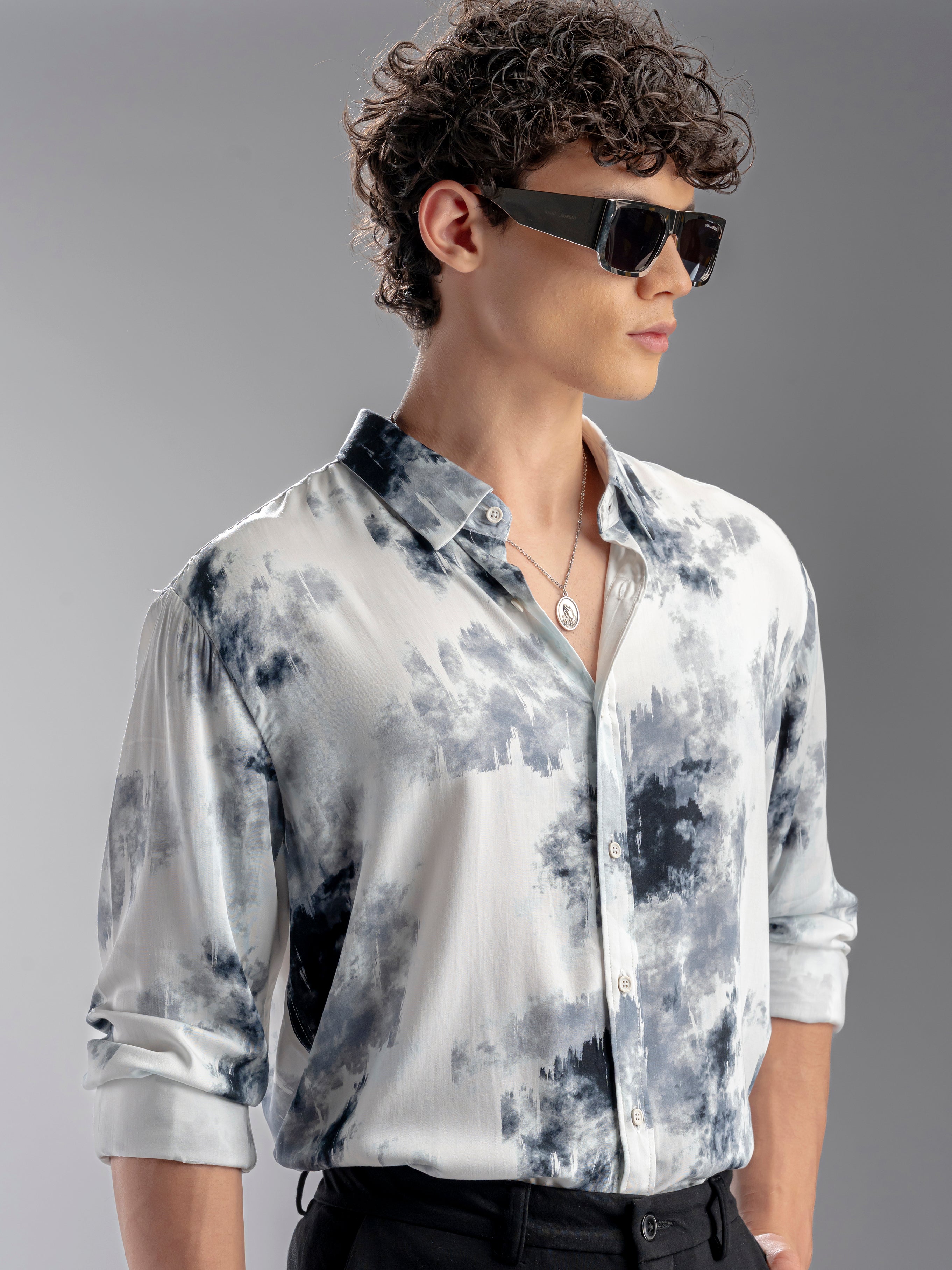 Person wearing a tie-dye shirt 