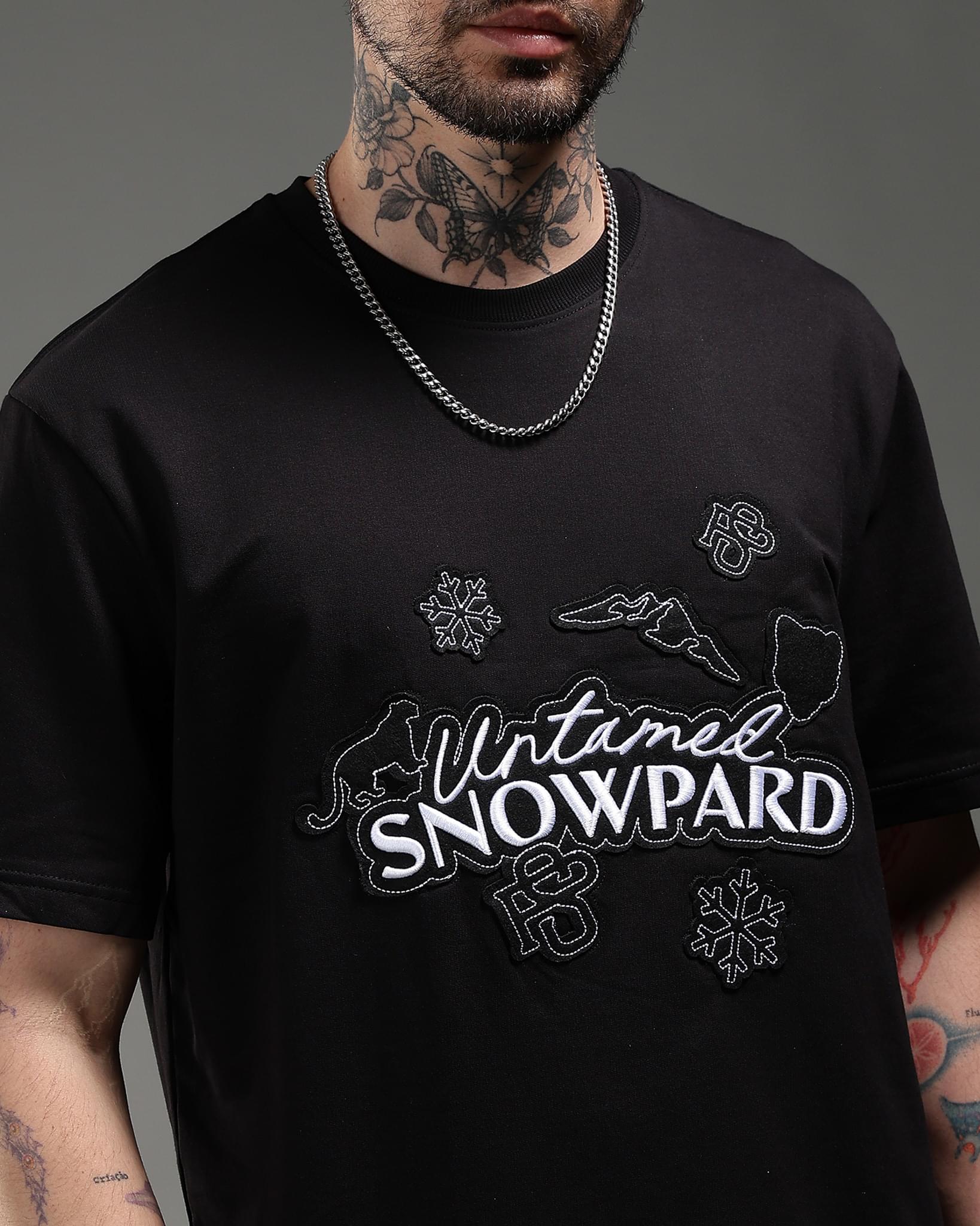 Snowpard Black Icon Embroidered Tee Black — side view, premium Supima cotton tee