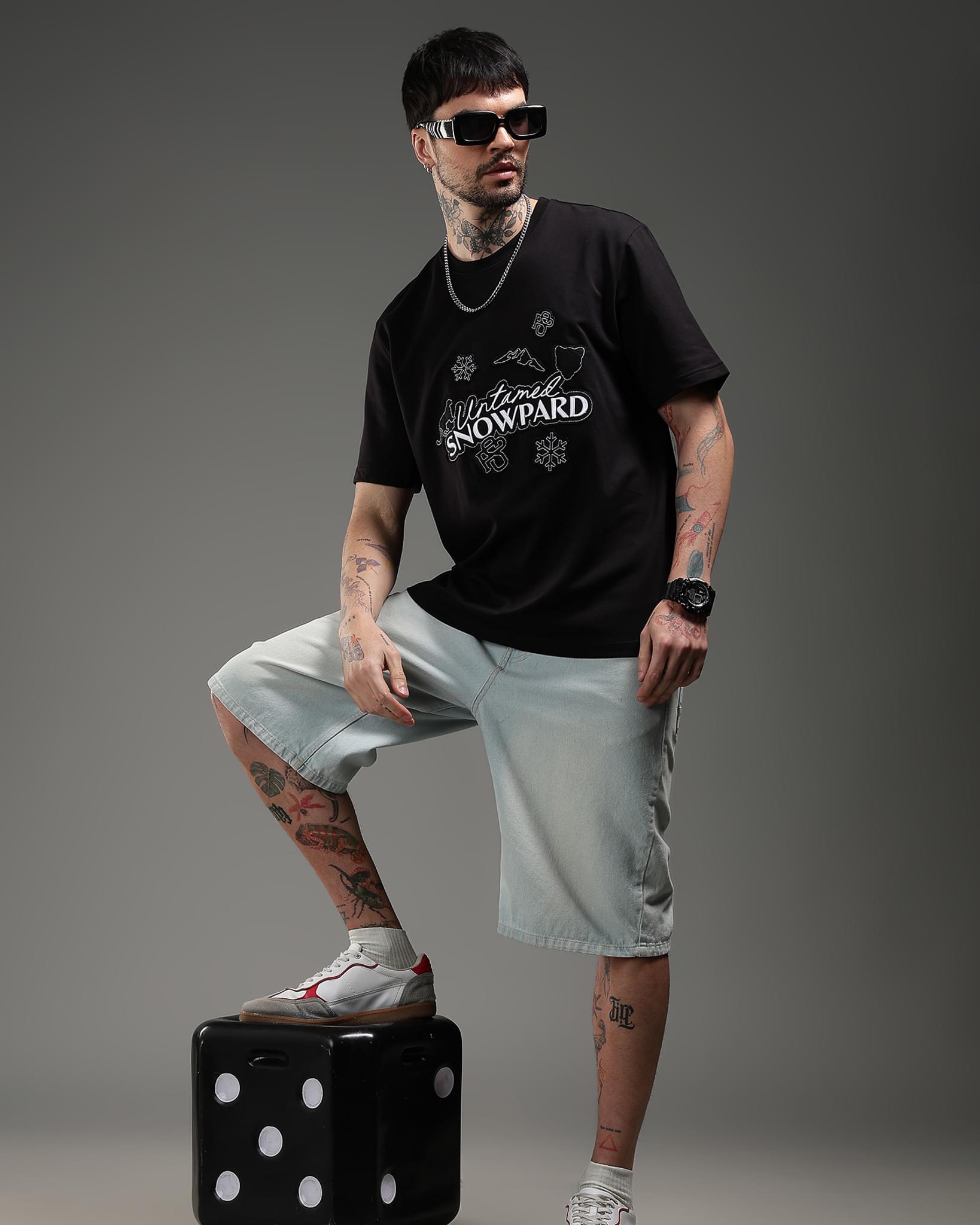 Snowpard Black Icon Embroidered Tee Black — model shot, premium men's embroidered t-shirt