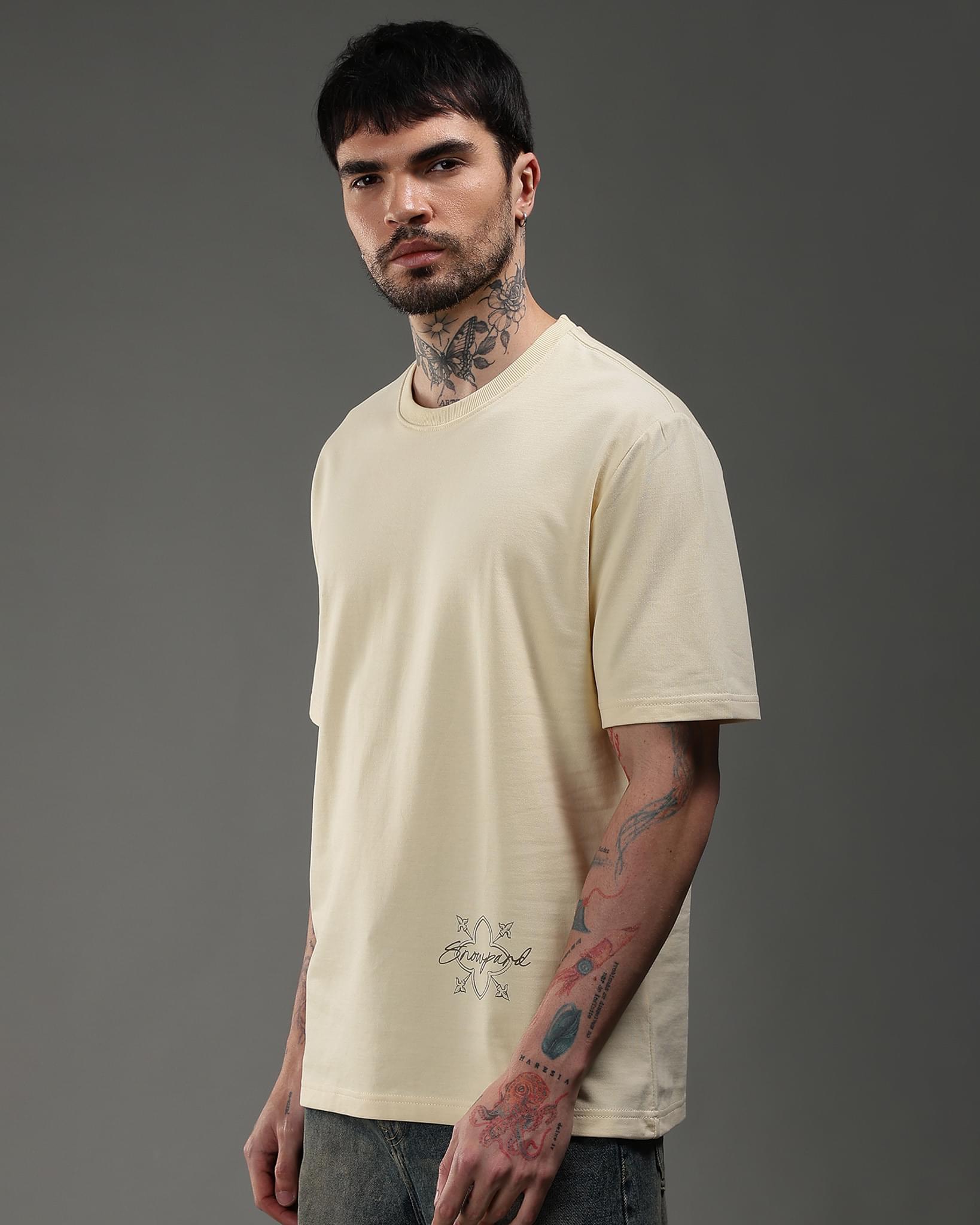 Snowpard Desert Sigil Relaxed Tee Sand Beige — side view, premium Supima cotton relaxed tee