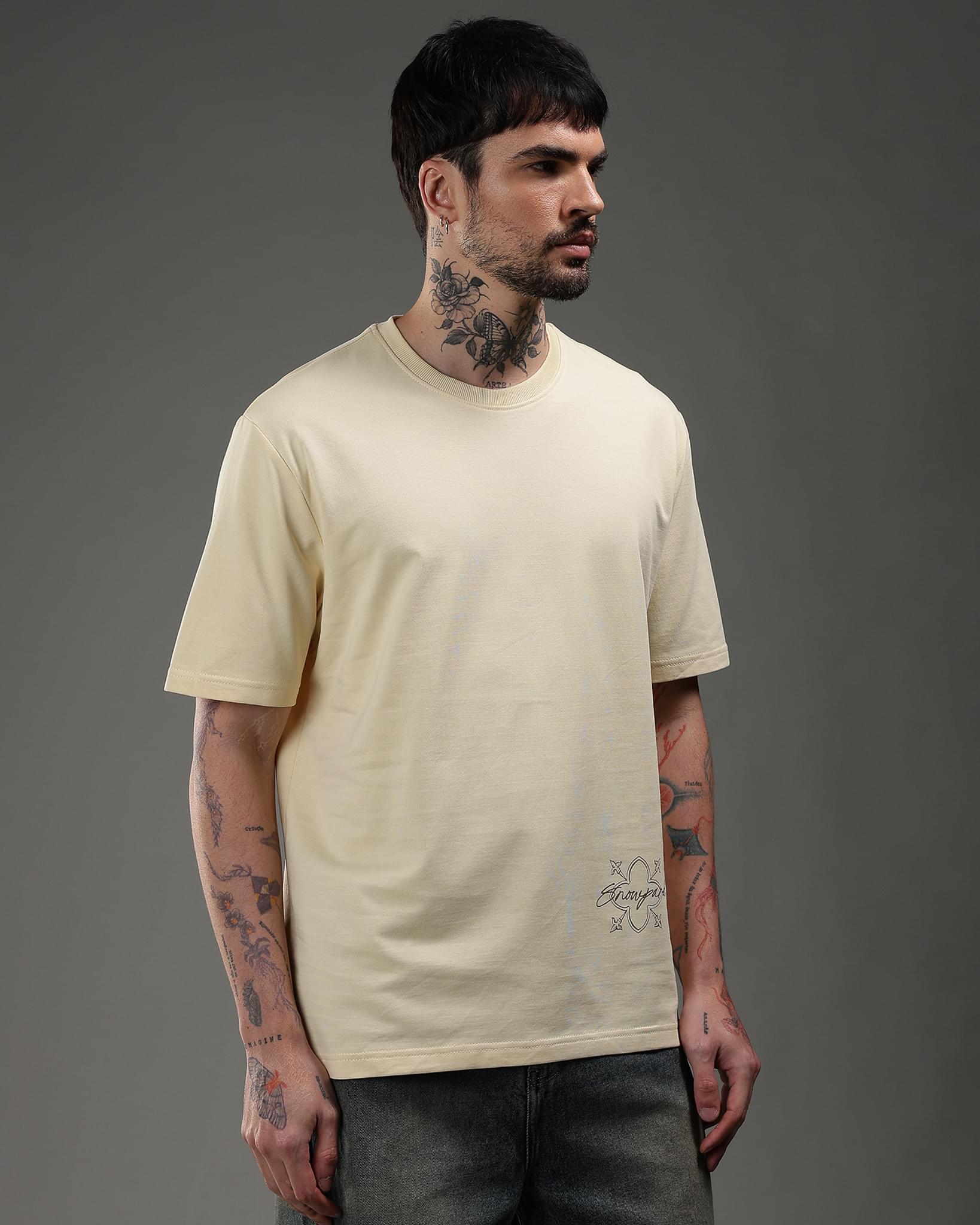 Snowpard Desert Sigil Relaxed Tee Sand Beige — chest detail, minimal front graphic