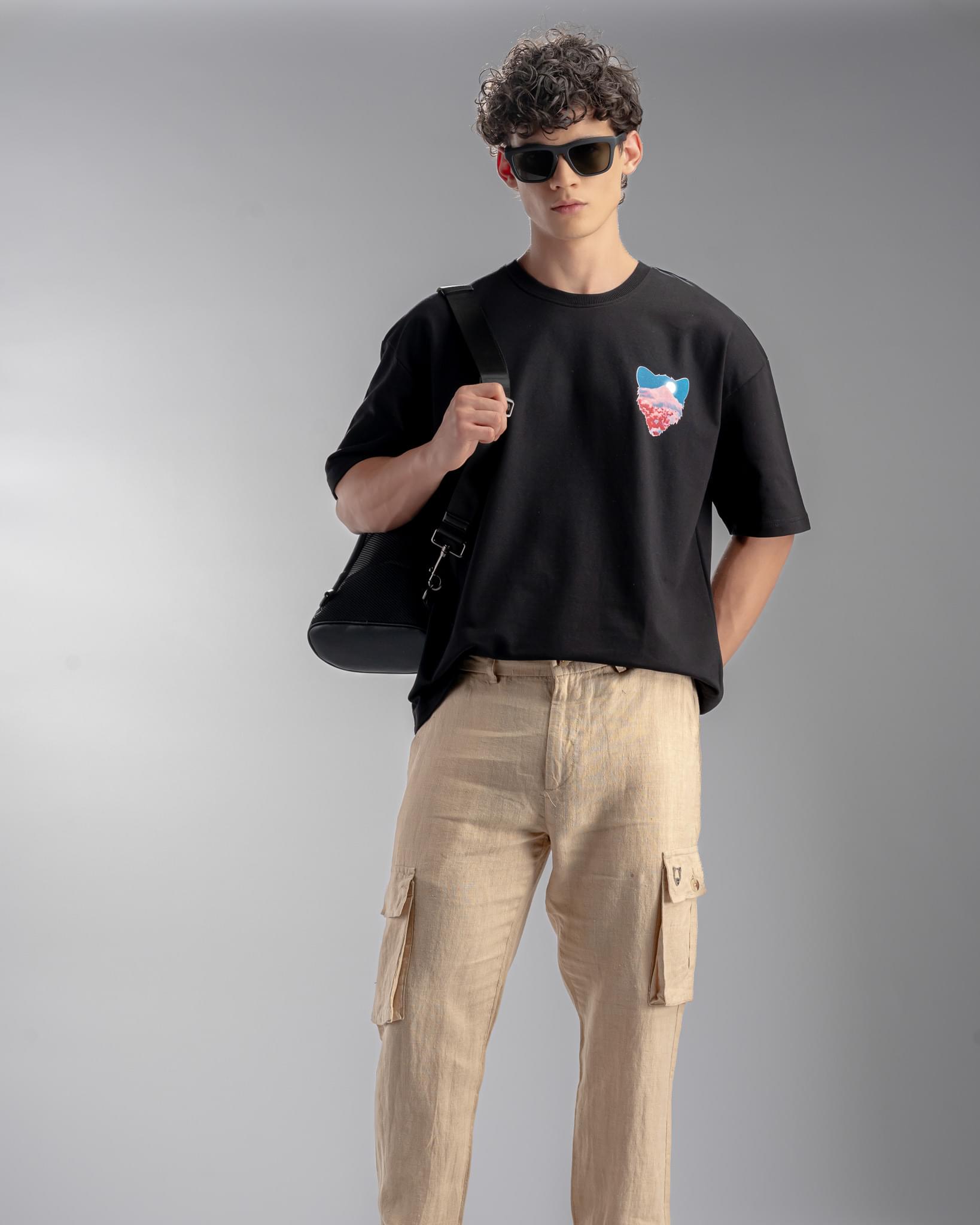 Snowpard Ghost of Mountains Puff Print Tee Black — model shot, premium men's graphic t-shirt