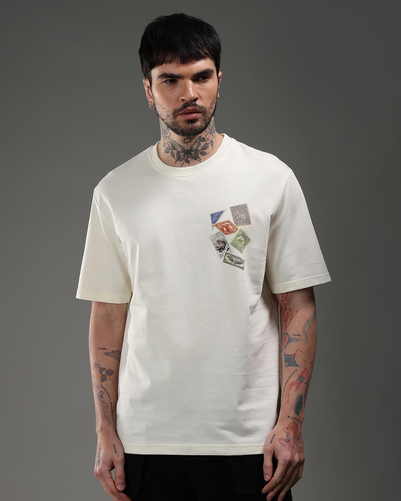 Snowpard Global Stamps Relaxed Tee Off White — back view, oversized framed stamp wolf artwork