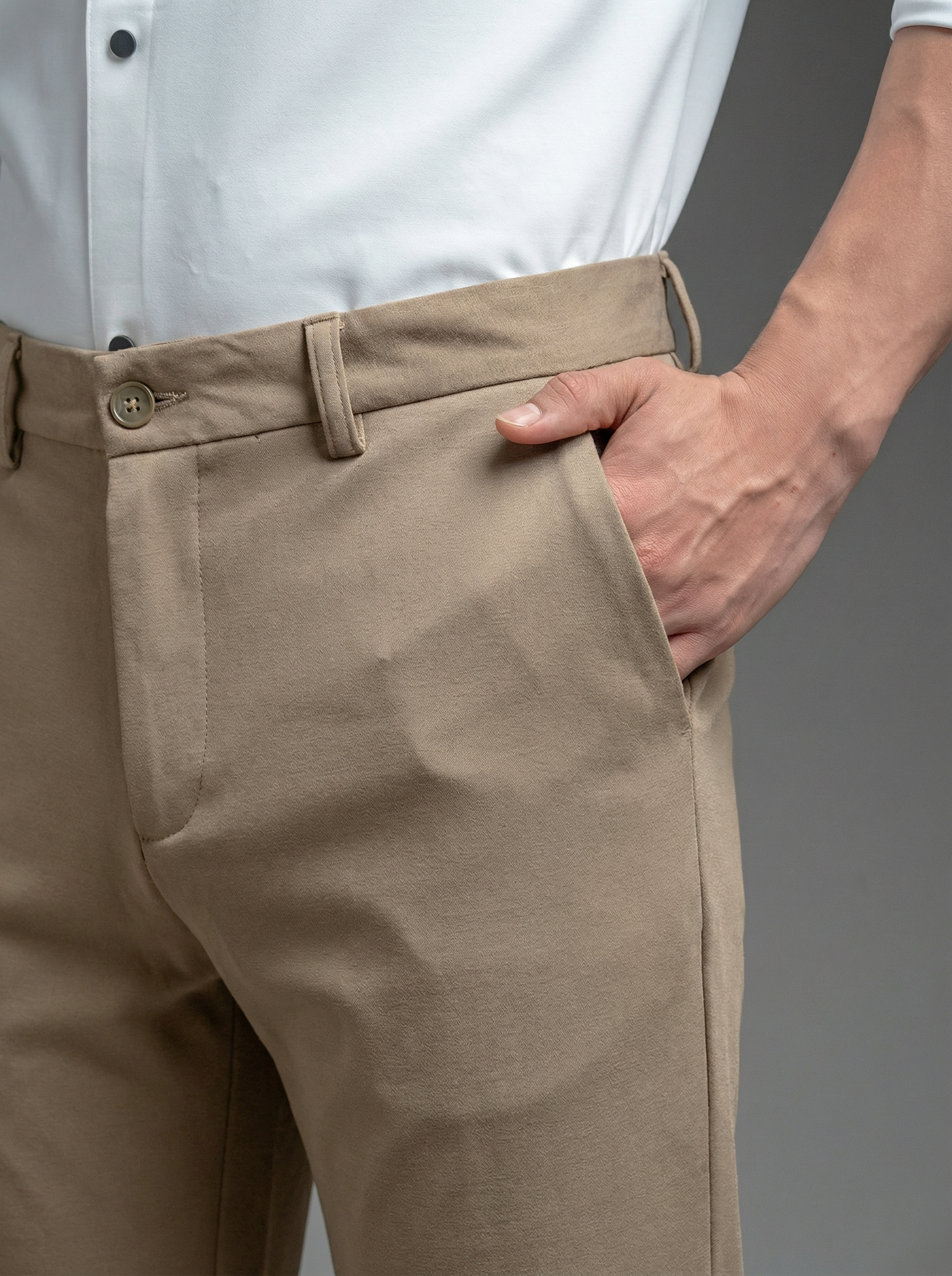 Snowpard Lyon Stretch Trouser Beige — three quarter view, premium stretch bottoms