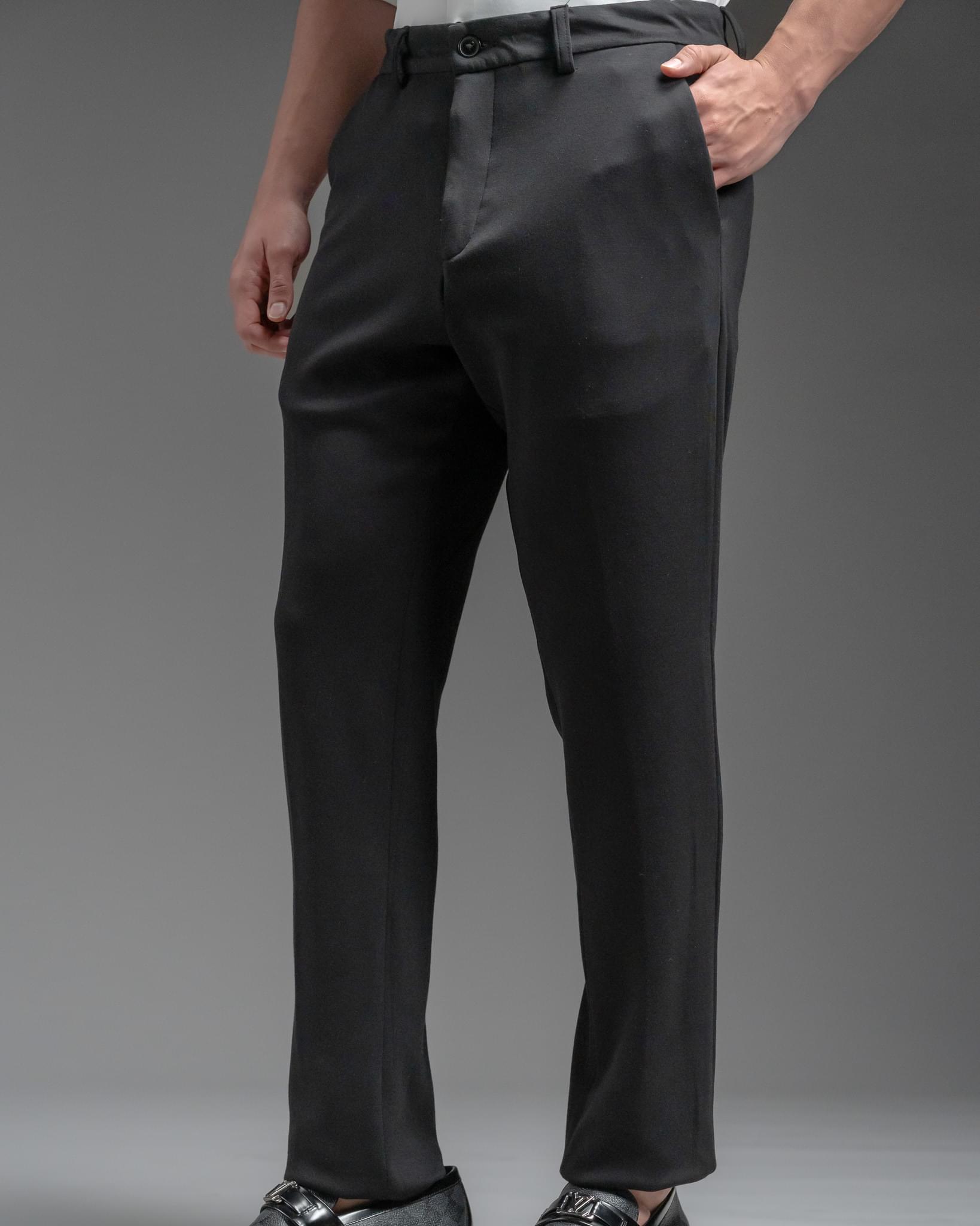 Snowpard Lyon Stretch Trouser Black — three quarter view, premium stretch bottoms