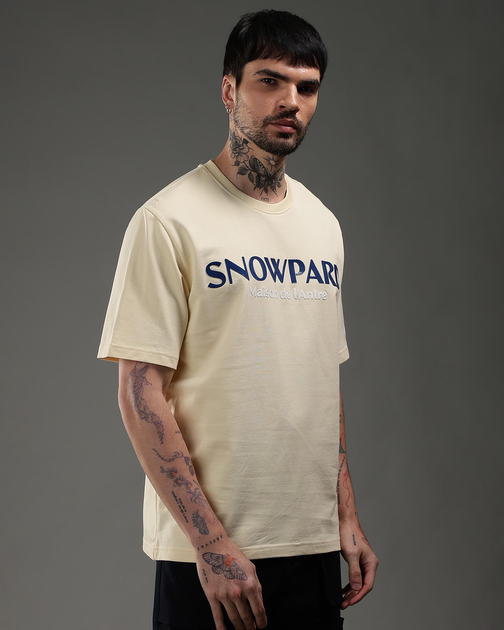 Snowpard Maison de l'Antre Relaxed Tee Beige — side view, premium Supima cotton tee
