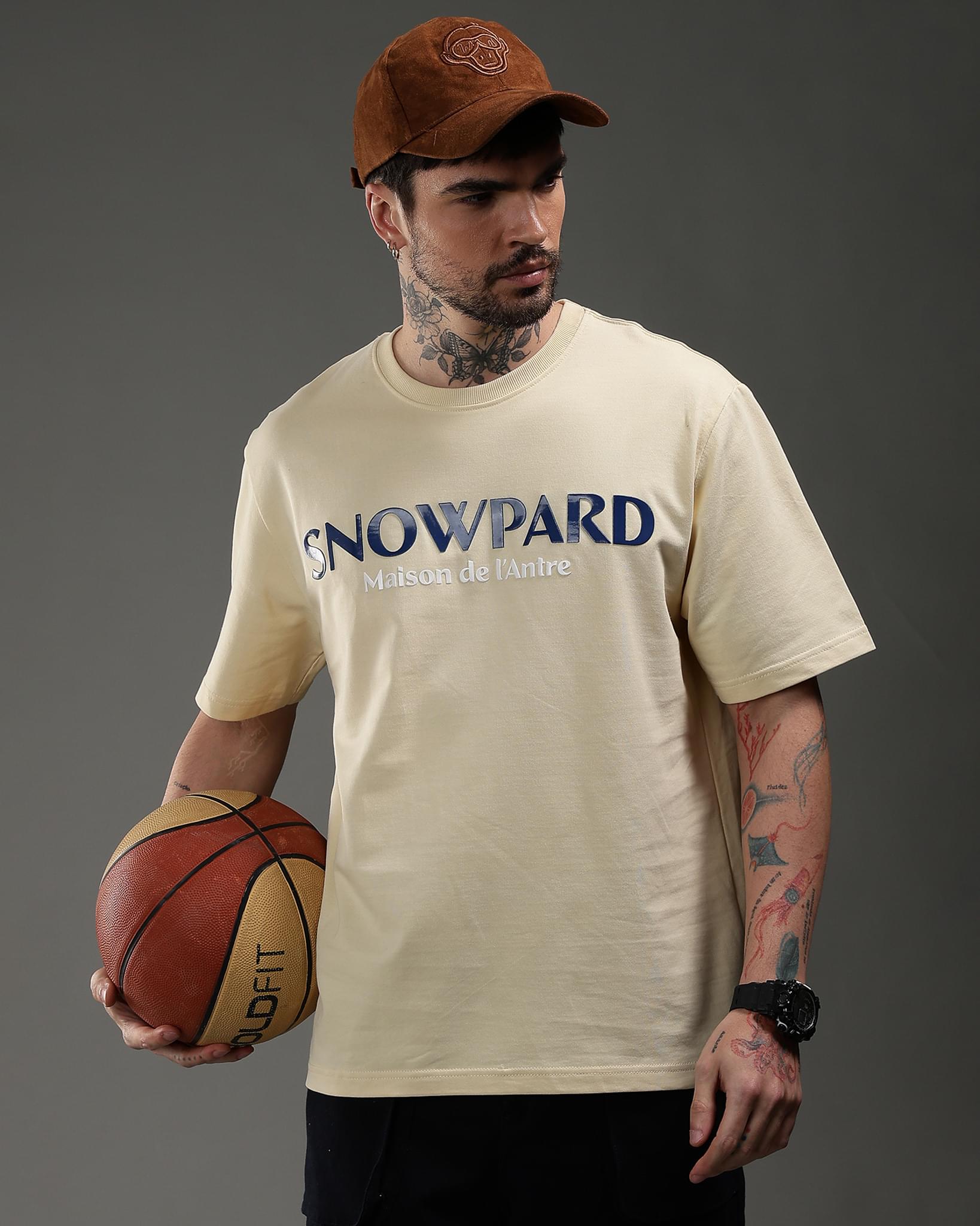 Snowpard Maison de l'Antre Relaxed Tee Beige — back artwork detail, statement chest graphic
