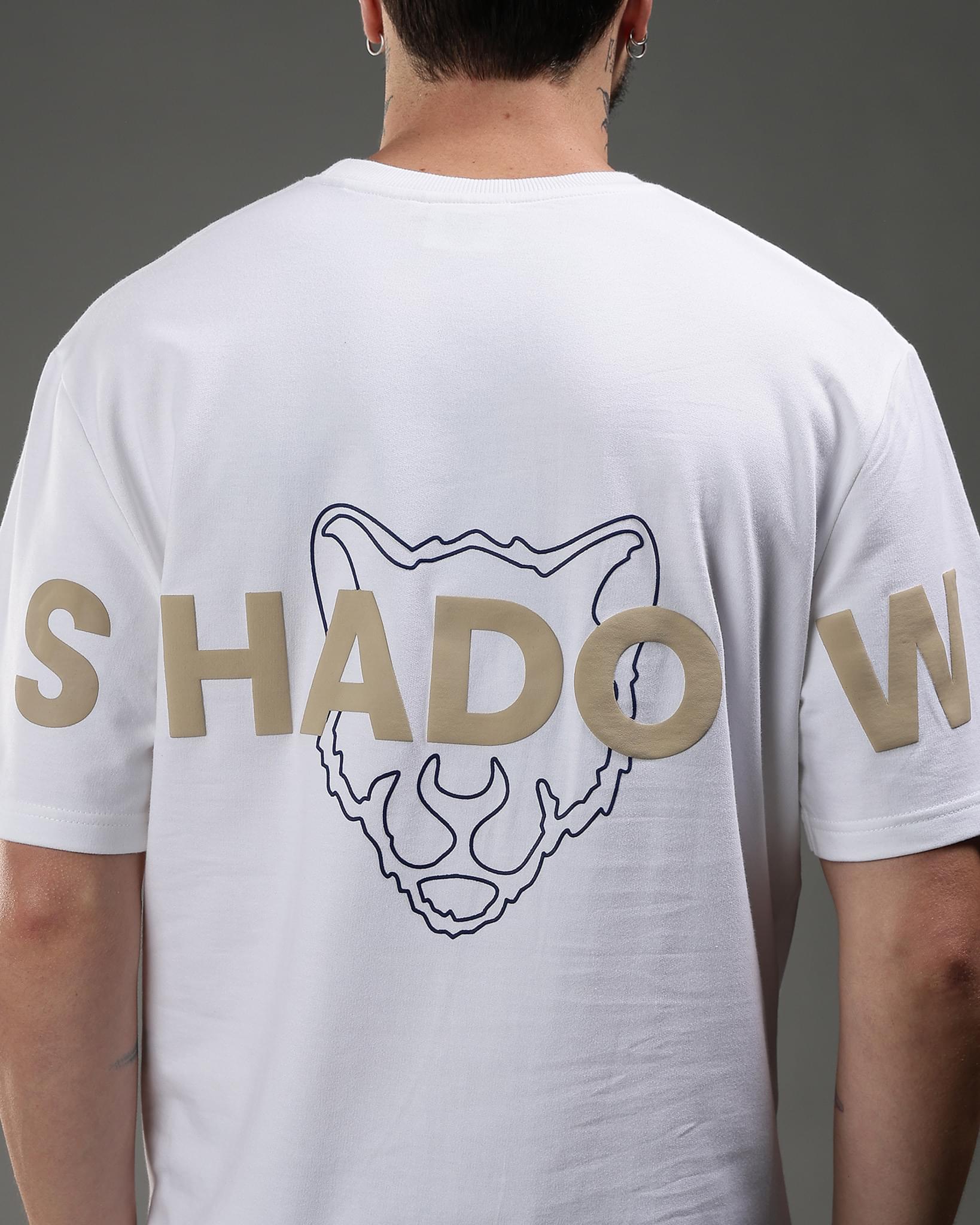Snowpard Shadow Story Puff Print Tee White — back artwork detail, raised puff typography