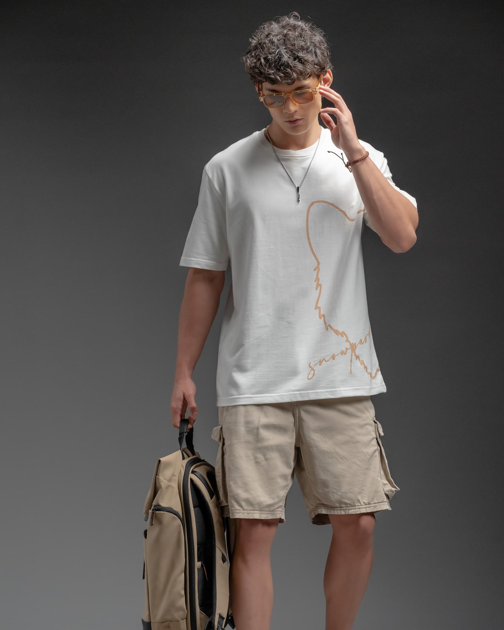 Snowpard Signature Script Tee White — model shot, men's designer graphic t-shirt