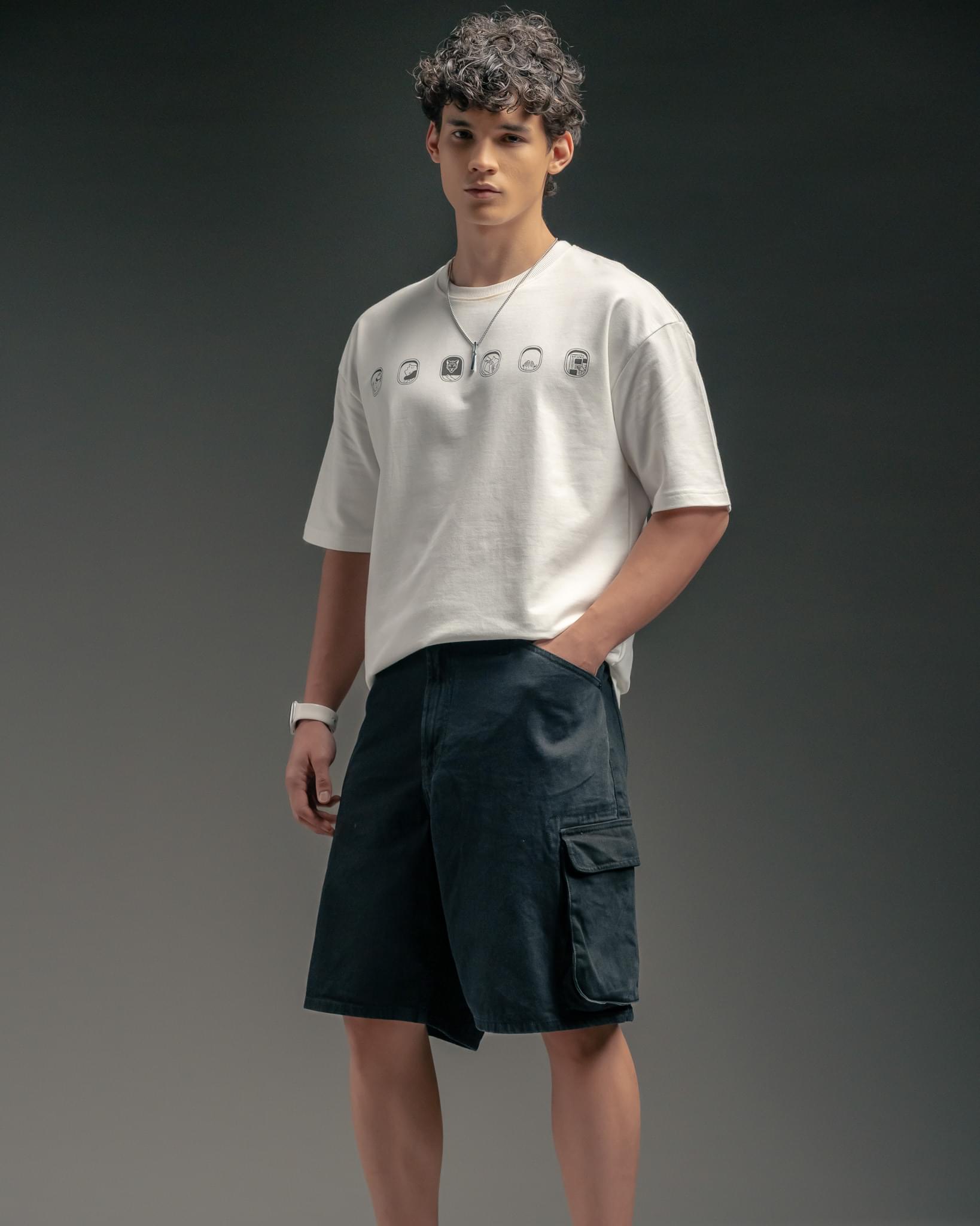Snowpard Stamped Flight Relaxed Tee White — model shot, men's designer graphic t-shirt