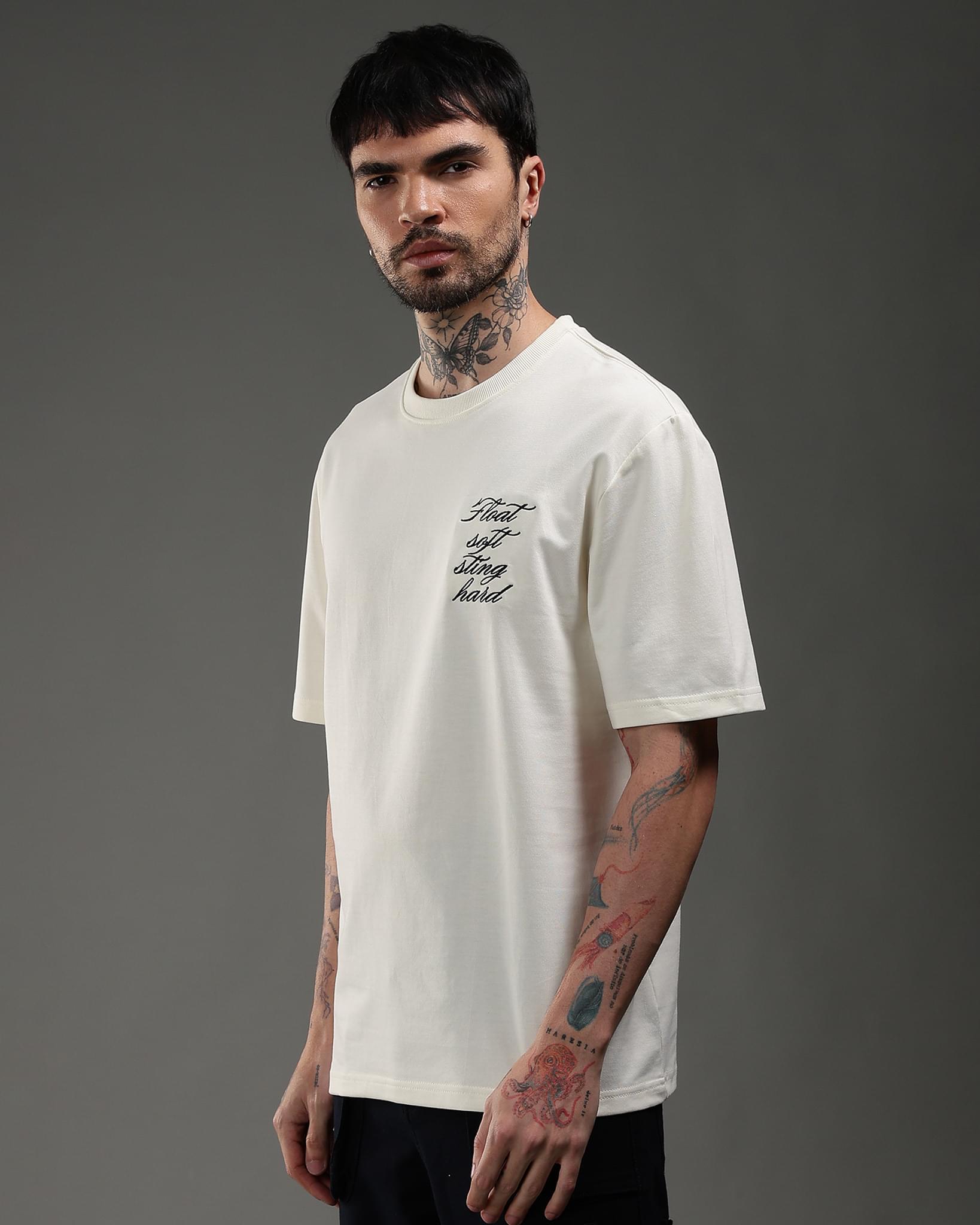 Snowpard Sting Hard Relaxed Tee Off White — chest detail, minimal front script