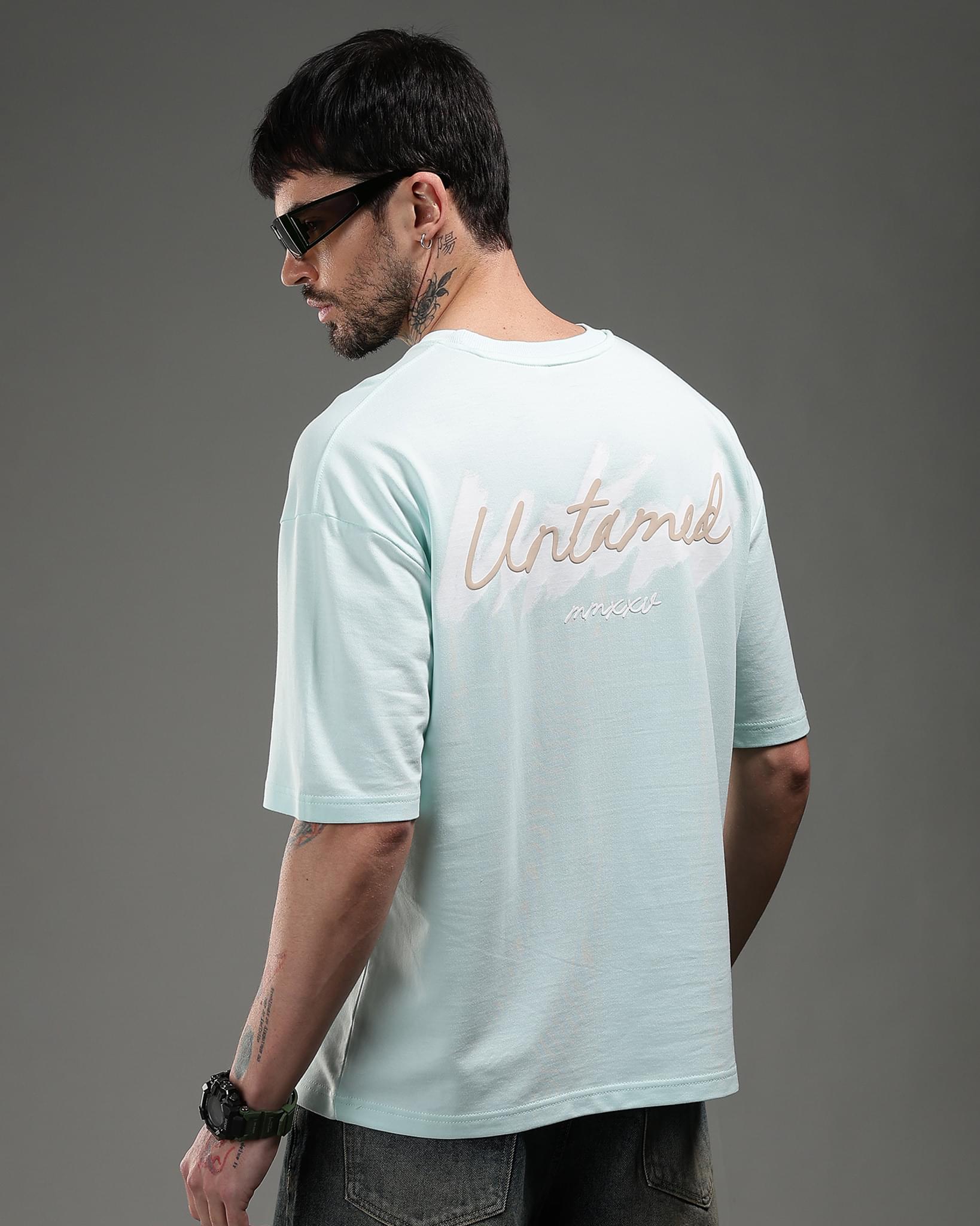 Snowpard Untamed Script Relaxed Tee Aqua Mist — back artwork detail, MMXXV script typography