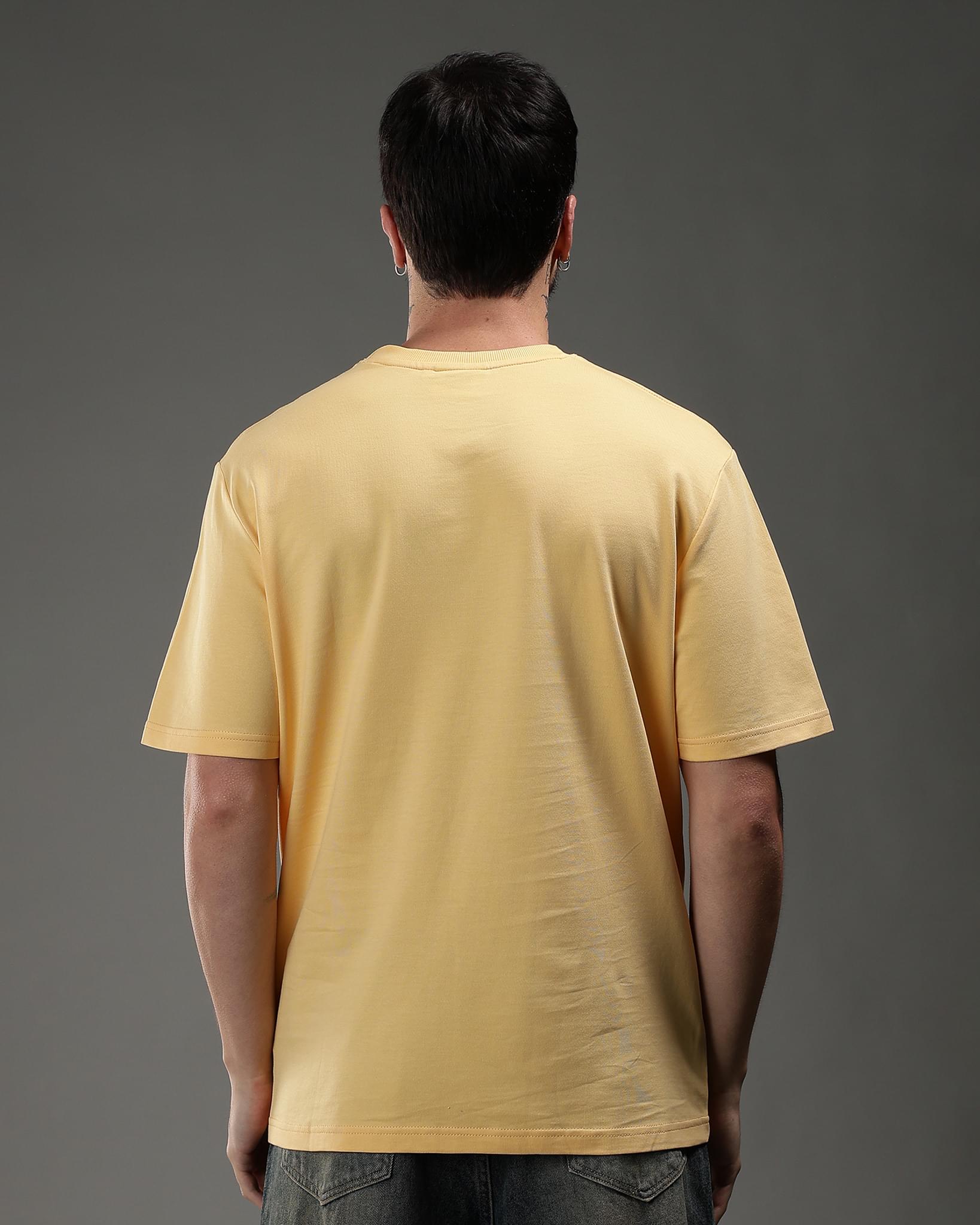 Snowpard Yellow Icon Embroidered Tee Yellow — back artwork detail, Untamed logo embroidery