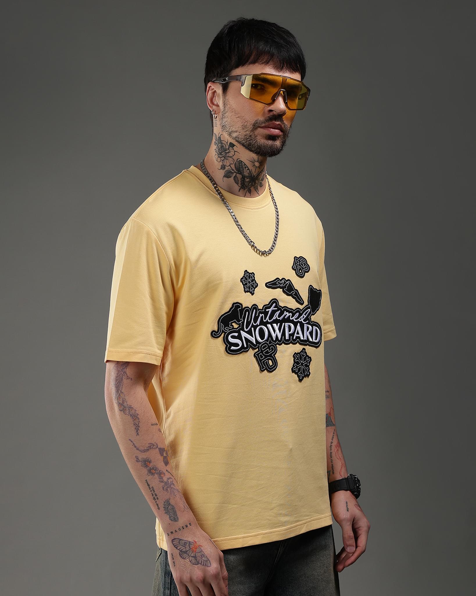 Snowpard Yellow Icon Embroidered Tee Yellow — model shot, premium men's embroidered t-shirt